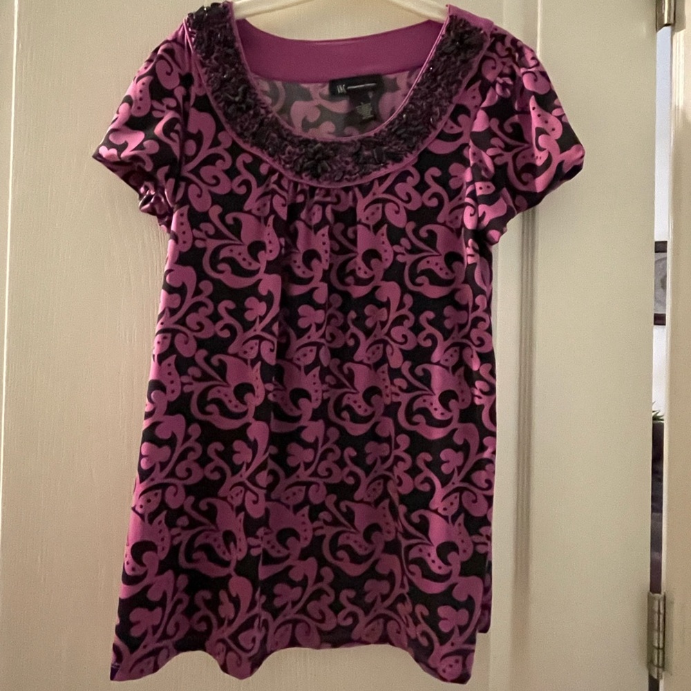 INC top size L fuchsia type color with black bling at collar